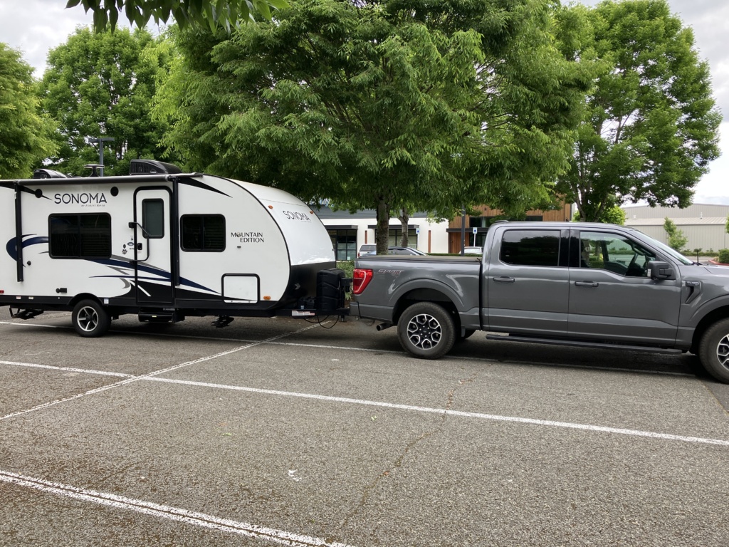 Our travel trailer Shortstack hitched up outside the bank the day we bought it.