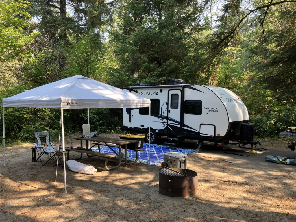 Our RV in the campsite at Fort Stevens State Park in Oregon